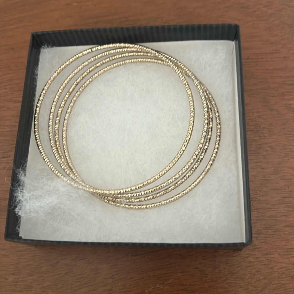 Set of Four Gold Bangle Bracelets